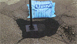 Image: Tamping Pothole Patch
