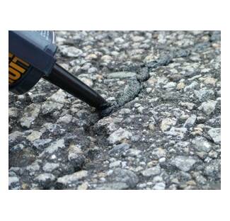 asphalt caulk crack using