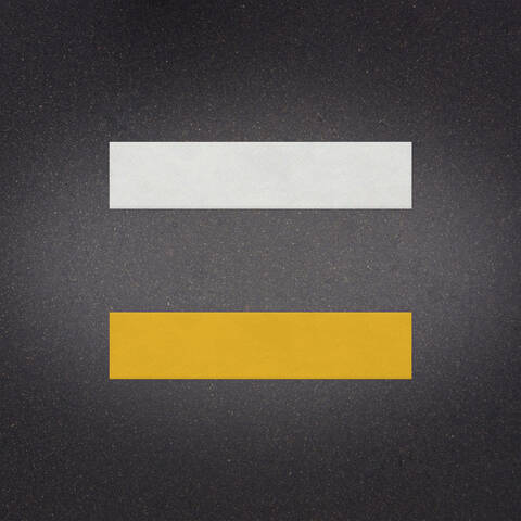 White over Yellow preformed thermoplastic example ontop of plastic showing relative sizes of 8 inches by 36 inches