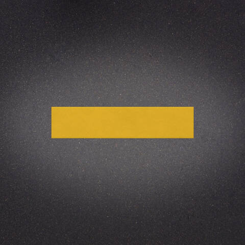 Stylish asphalt background with a yellow line representing a 8 inches by 3 foot Ennis-Flint Premark XF thermoplastic line
