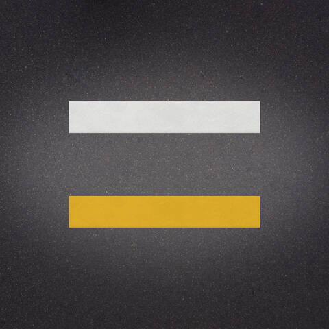 White over Yellow preformed thermoplastic example ontop of plastic showing relative sizes of 6 inches by 36 inches