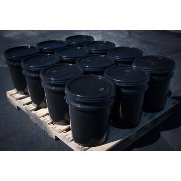 Pallet showing twelve buckets of 5 gallon BIGA asphalt sealer