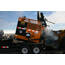 image: BIG A T2 Asphalt Recycler dumping in front loader