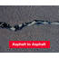 Closeup showing an asphalt to asphalt joint filled with black Crack Stix
